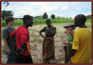 NASA staff discuss flooding with villagers in Namibia. Through the CEOS Flood Pilot, satellite imagery supports early warning for evacuations during the flood season. Source: NASA.